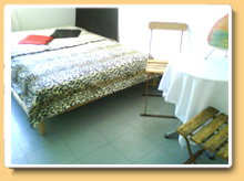 A big double bed in our guestroom in Berlin Kreuzberg