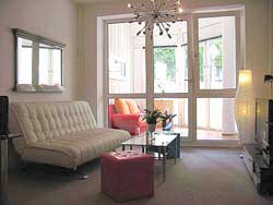 View of living room and conservatory