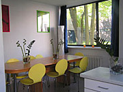 large table in the large apartment