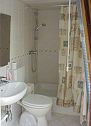 The bathroom with shower