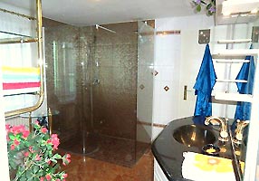 the bathroom with bath-tub in the holiday house