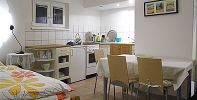 room with mini kitchen