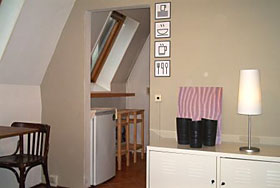 Balcony room with television and parquet 