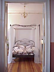 The four-poster bed