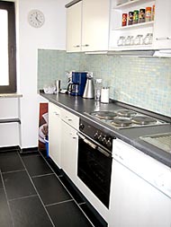 Kitchen with stove and everything you need for a short stay