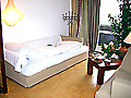 comfortable guestroom with sofabed and breakfast