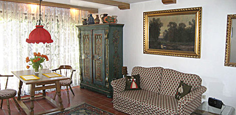 daybed and dining table in the apartment