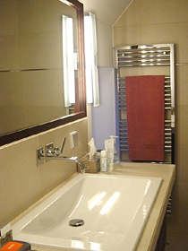 modern bathroom with shower for shared use